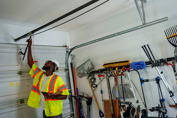 Professional Garage Door technician working in Wild Peach Village, TX